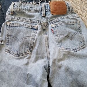 Levies 512 slim fit faded and worn blue jeans